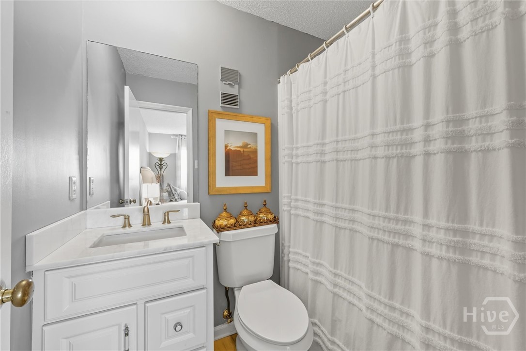 207 Azalea Road, Unit 21 Midway, GA 31320 - Photo 25 of 46 En-suite full bath.