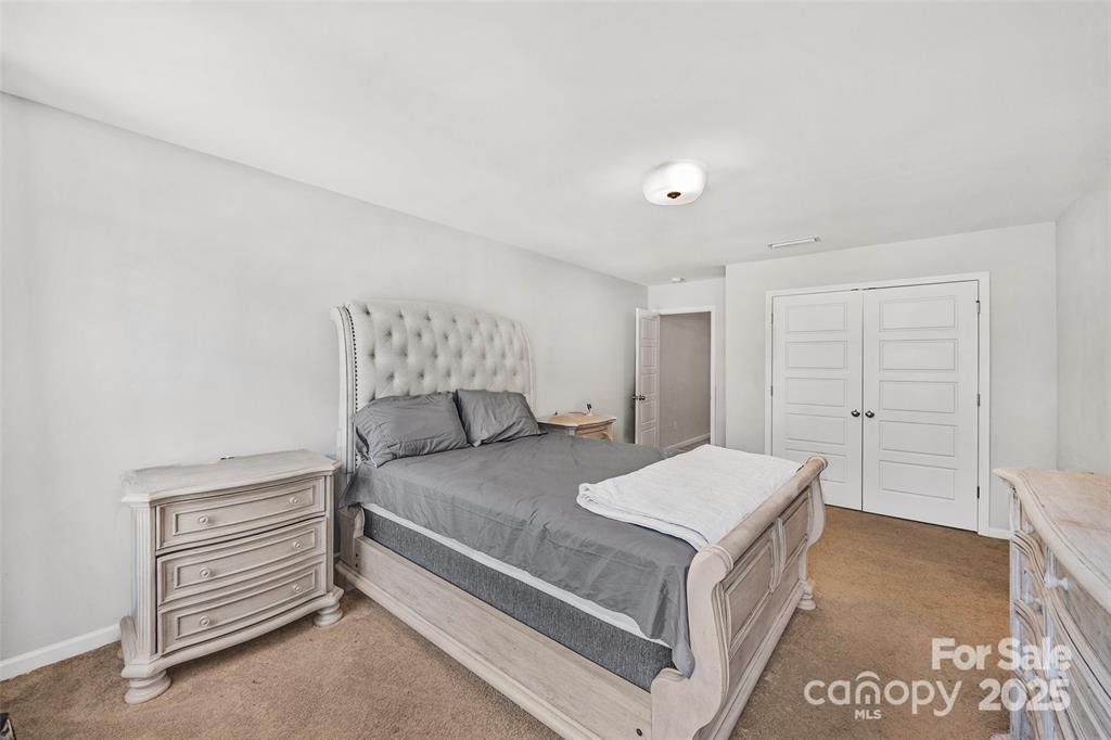 1117 Streamside Lane York, SC 29745 - Photo 13 of 21 a bed room with a bed and a chair