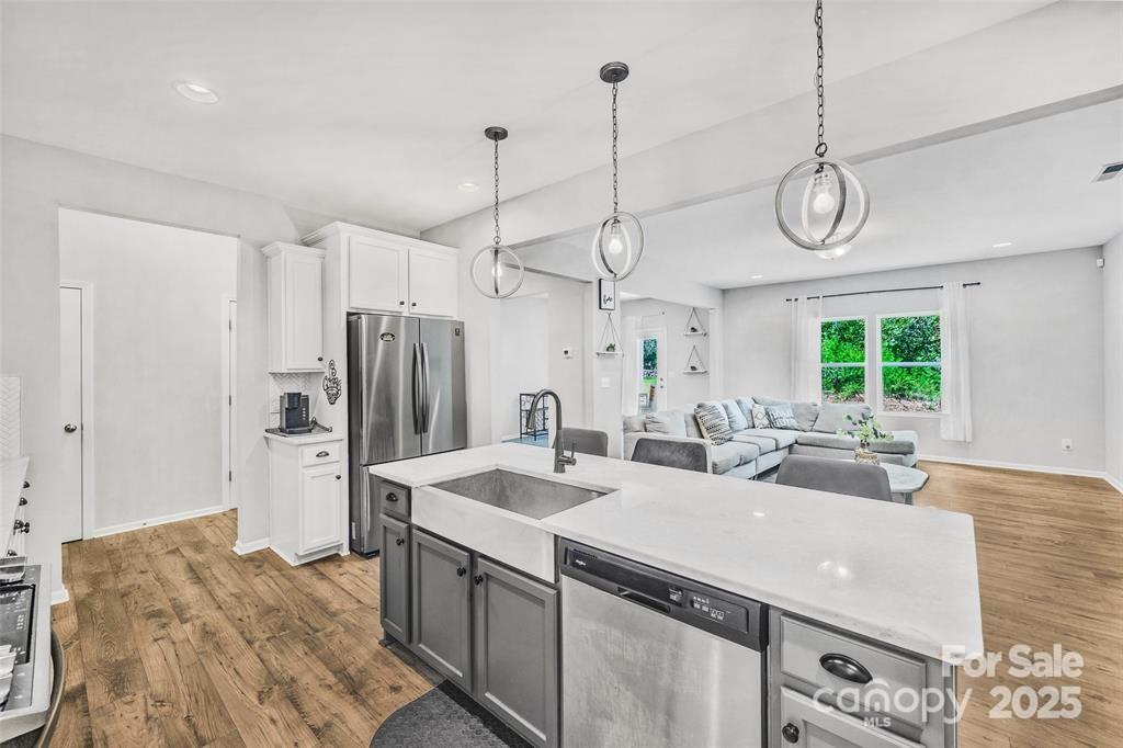 1117 Streamside Lane York, SC 29745 - Photo 4 of 21 a view of a kitchen center island and stainless steel appliances