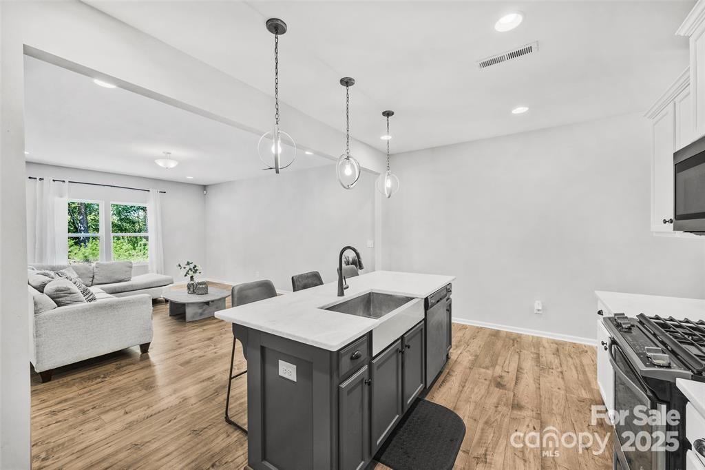1117 Streamside Lane York, SC 29745 - Photo 5 of 21 a living room with furniture and a table