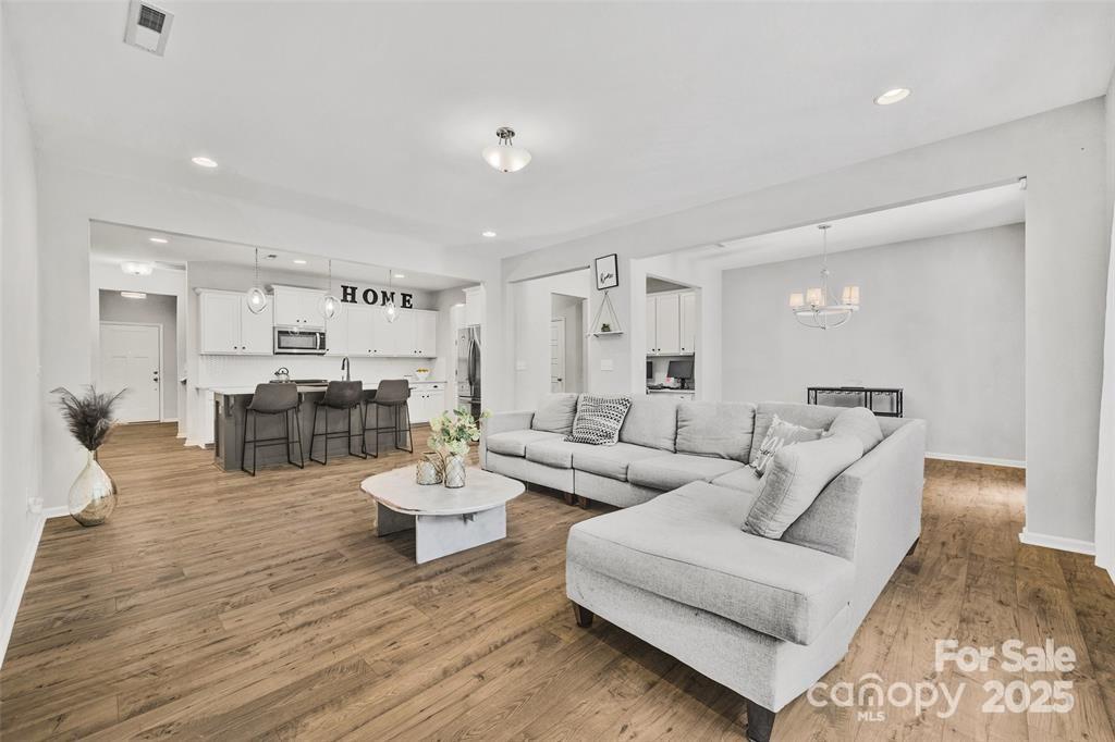 1117 Streamside Lane York, SC 29745 - Photo 8 of 21 a living room with furniture and view of kitchen