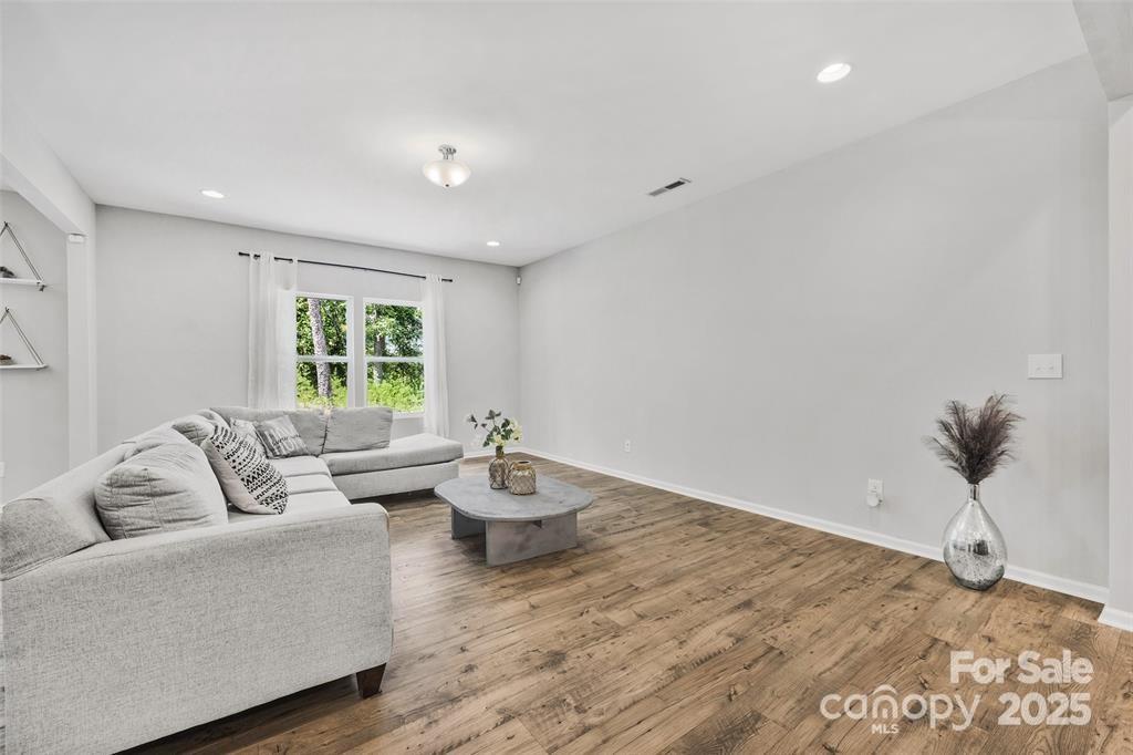 1117 Streamside Lane York, SC 29745 - Photo 9 of 21 a living room with furniture and a window
