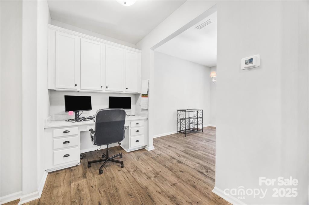 1117 Streamside Lane York, SC 29745 - Photo 10 of 21 a view of workspace with furniture and wooden floor