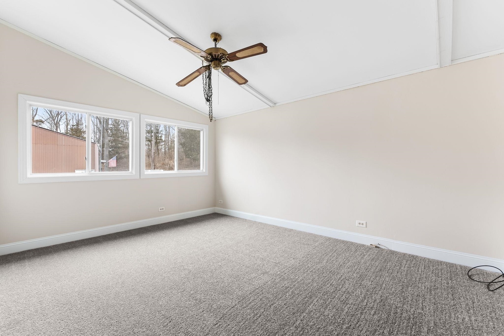 1920 River Vista Road Muscatine, IA 52761 - Photo 18 of 24 an empty room with windows and fan