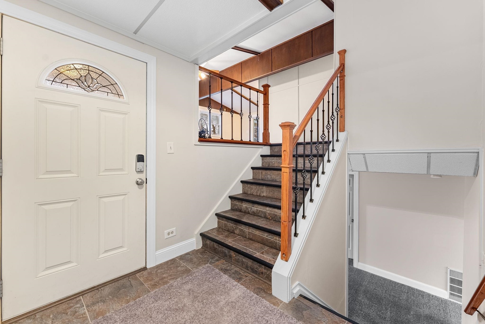 1920 River Vista Road Muscatine, IA 52761 - Photo 6 of 24 a view of entryway with stairs