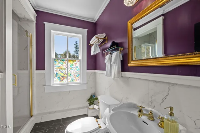 a picture of a room with a white wall and picture