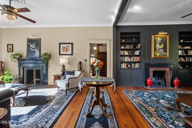 a bedroom with a bed and a fireplace