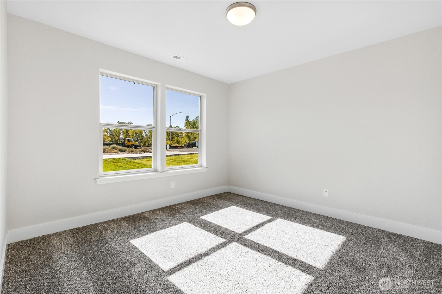 4246 Sandy Street Moses Lake, WA 98837 - Photo 16 of 29 an empty room with windows