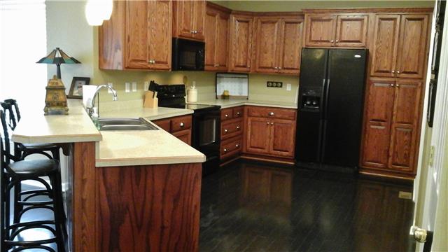 11135 New Cut Off Road Bon Aqua, TN 37025 - Photo 4 of 19 Kitchen cabinets galore and it also has a pantry!