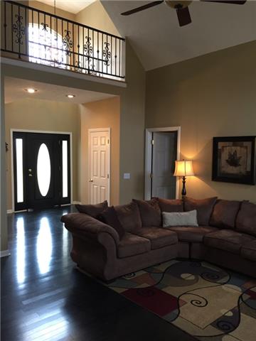 11135 New Cut Off Road Bon Aqua, TN 37025 - Photo 6 of 19 Living room with upstairs balcony and cathedral ceiling