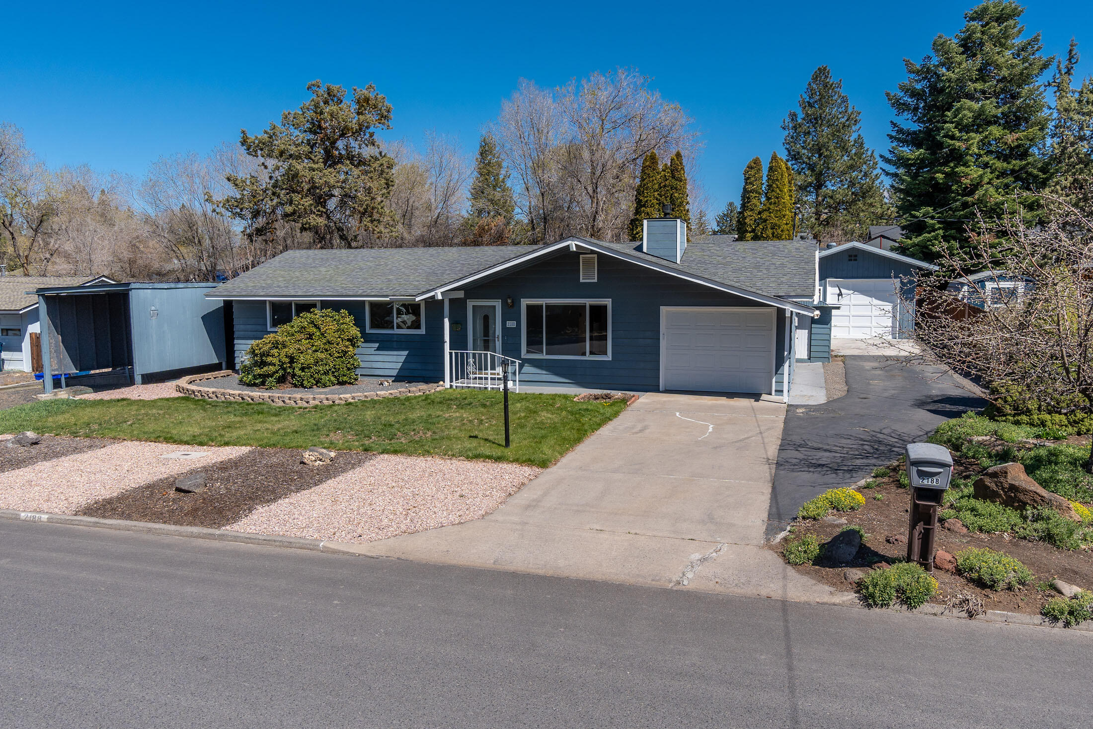 2188 Northeast Shepard Road Bend, OR 97701 - Photo 5 of 52 Mid-town cottage with large yards front and back, attached garage, detached garage, and detached RV carport.
