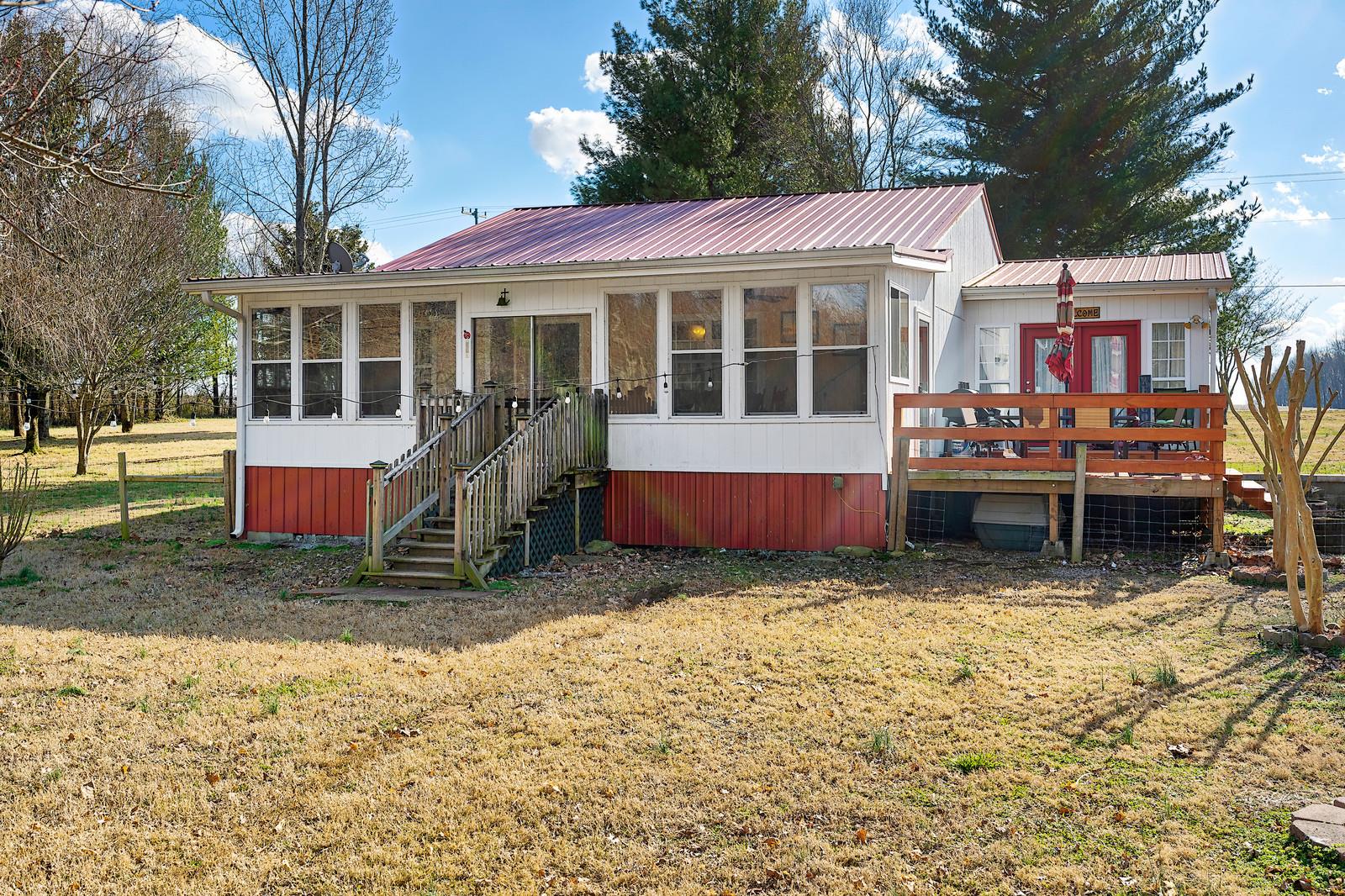 2958 Kinneys Road Cedar Hill, TN 37032 - Photo 6 of 30 a view of house with yard and sitting area