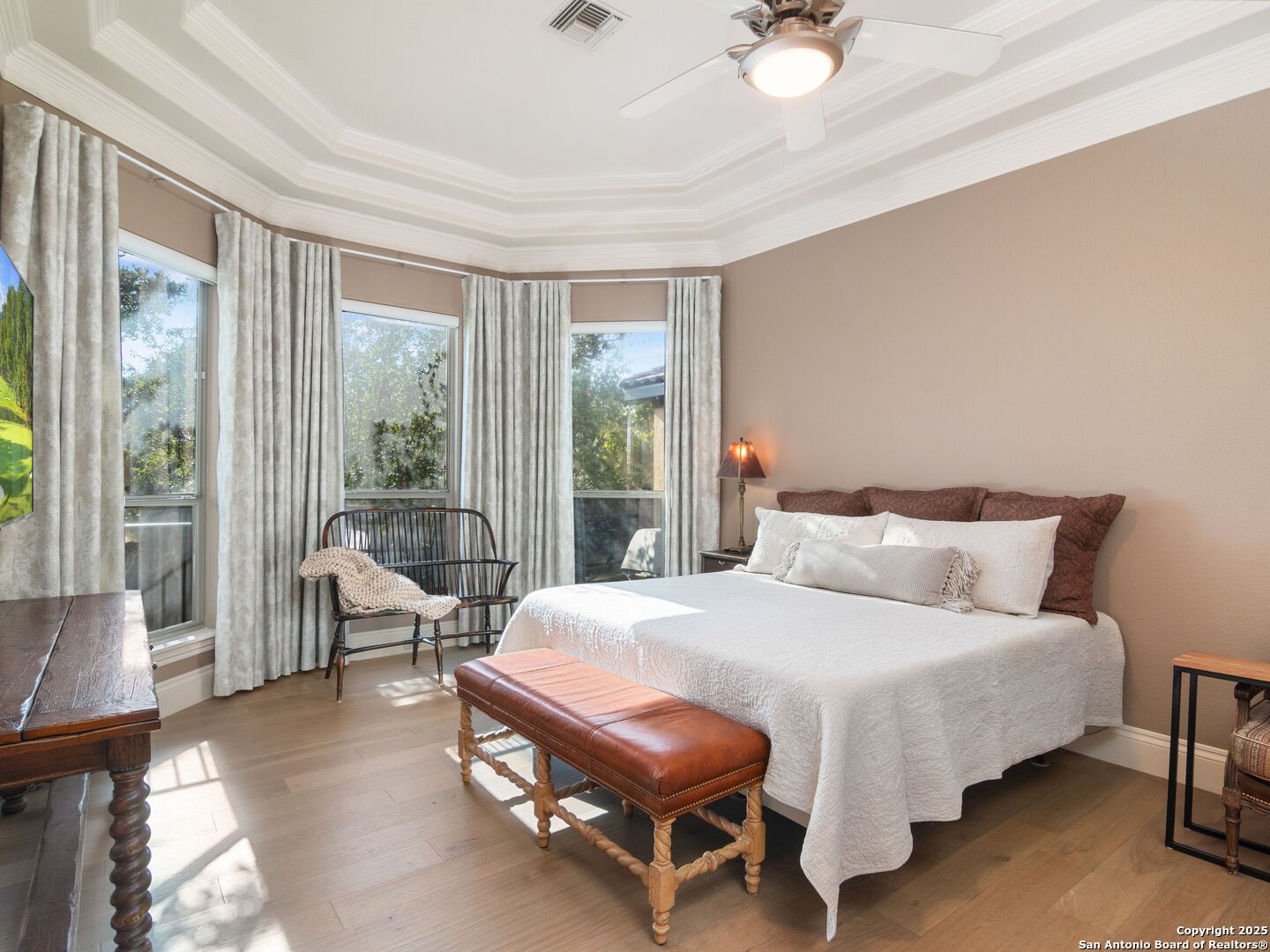 31 Stratton Lane San Antonio, TX 78257 - Photo 17 of 42 a bedroom with a bed and large window