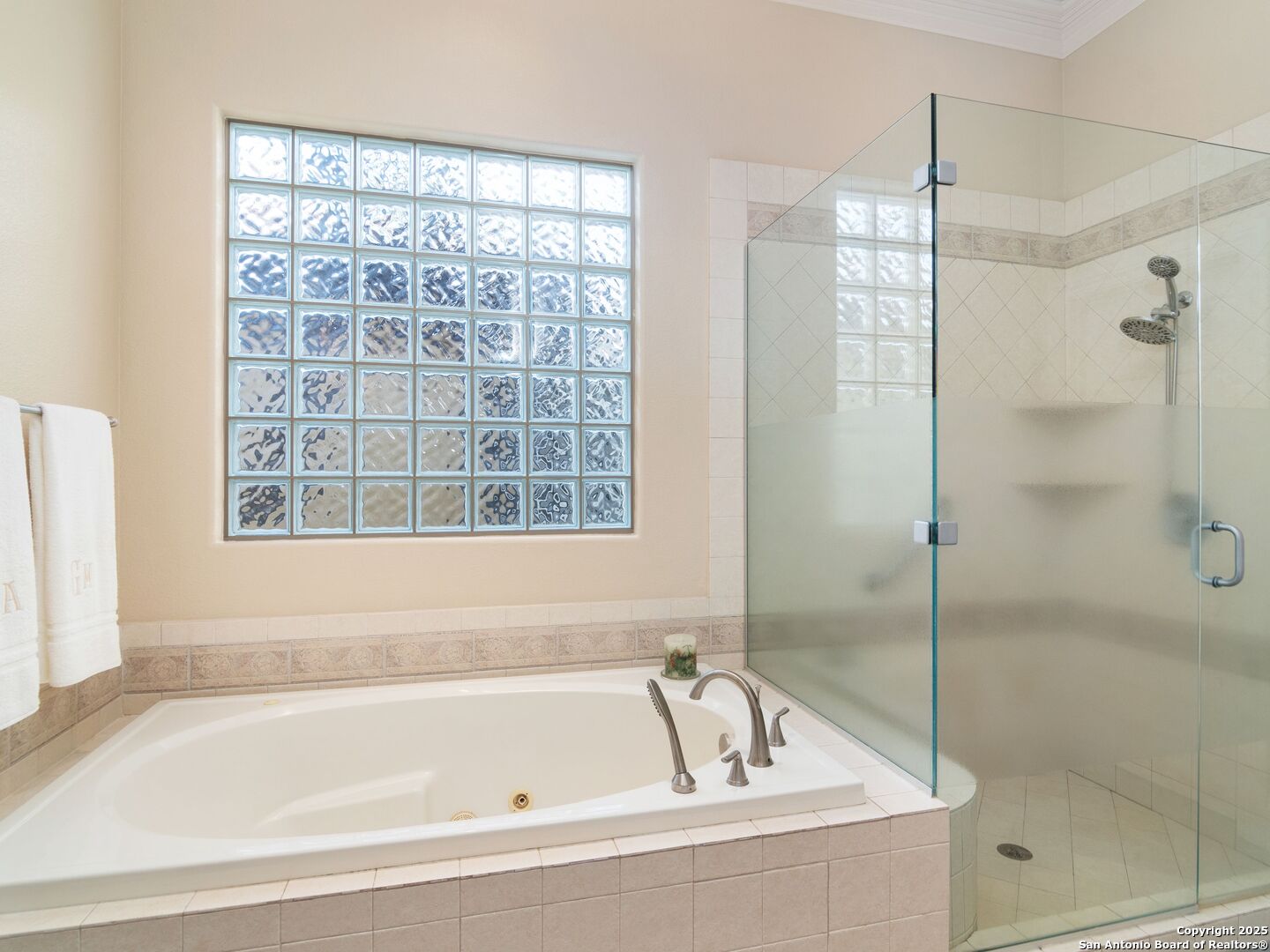 31 Stratton Lane San Antonio, TX 78257 - Photo 19 of 42 a bathroom with a bathtub and a shower