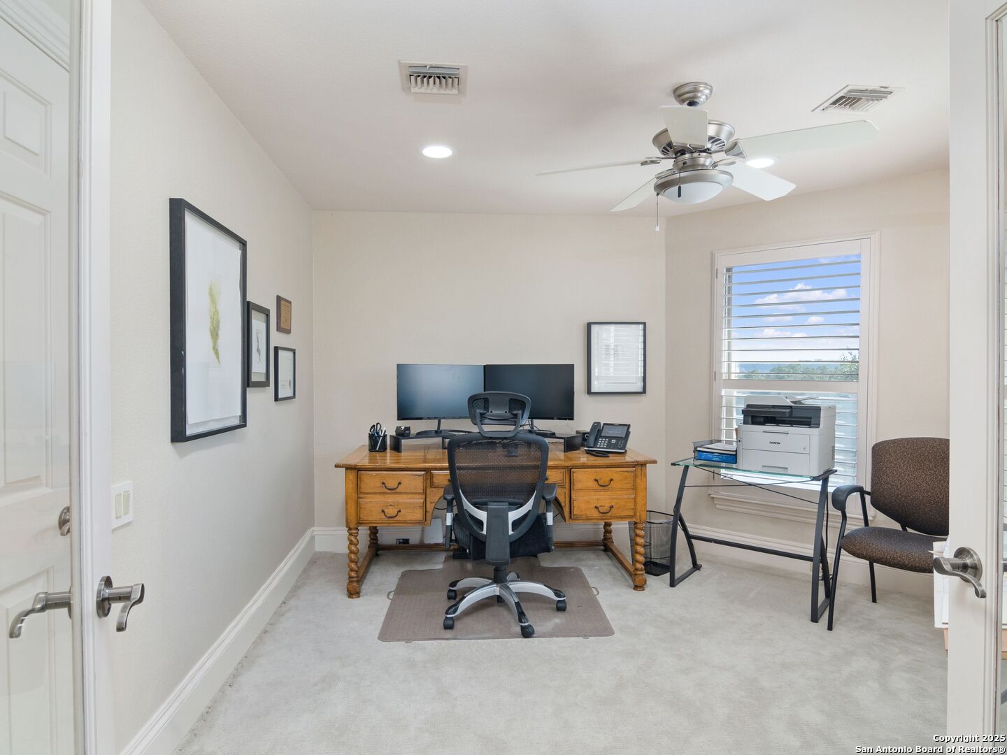 31 Stratton Lane San Antonio, TX 78257 - Photo 23 of 42 a view of a workspace with furniture and a window