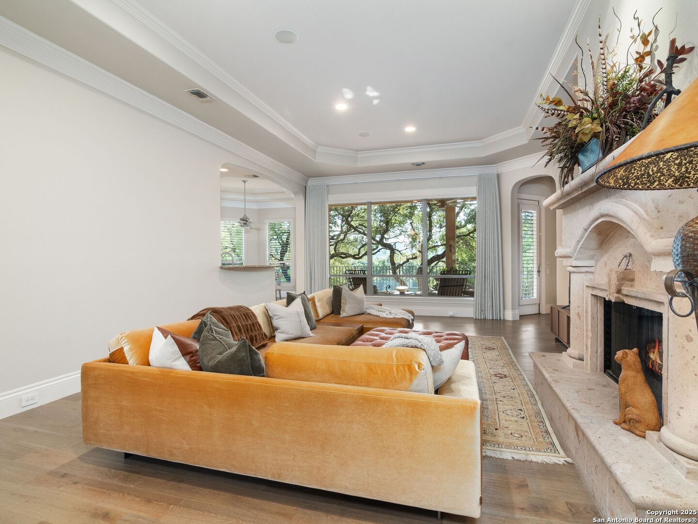 31 Stratton Lane San Antonio, TX 78257 - Photo 7 of 42 a living room with furniture and a fireplace