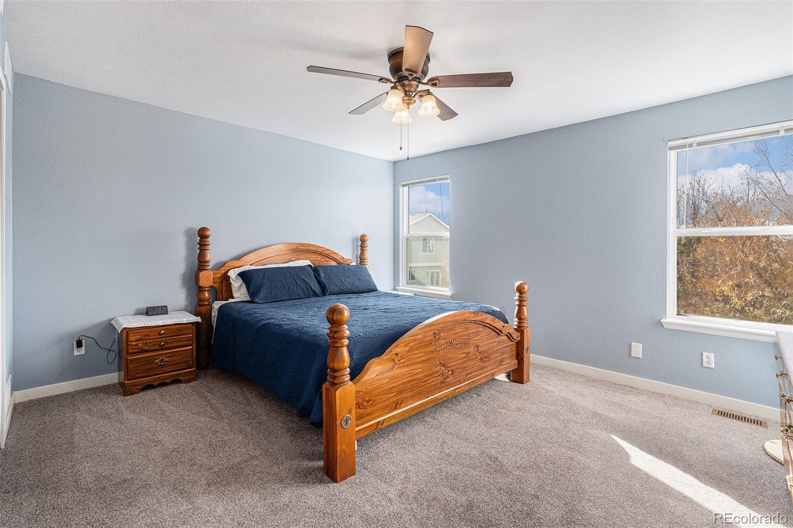 1085 Mockingbird Street Brighton, CO 80601 - Photo 9 of 21 a bedroom with bed and window