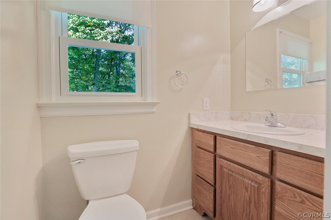 1930 Esquire Road North Chesterfield, VA 23235 - Photo 16 of 26 a bathroom with a toilet sink and mirror