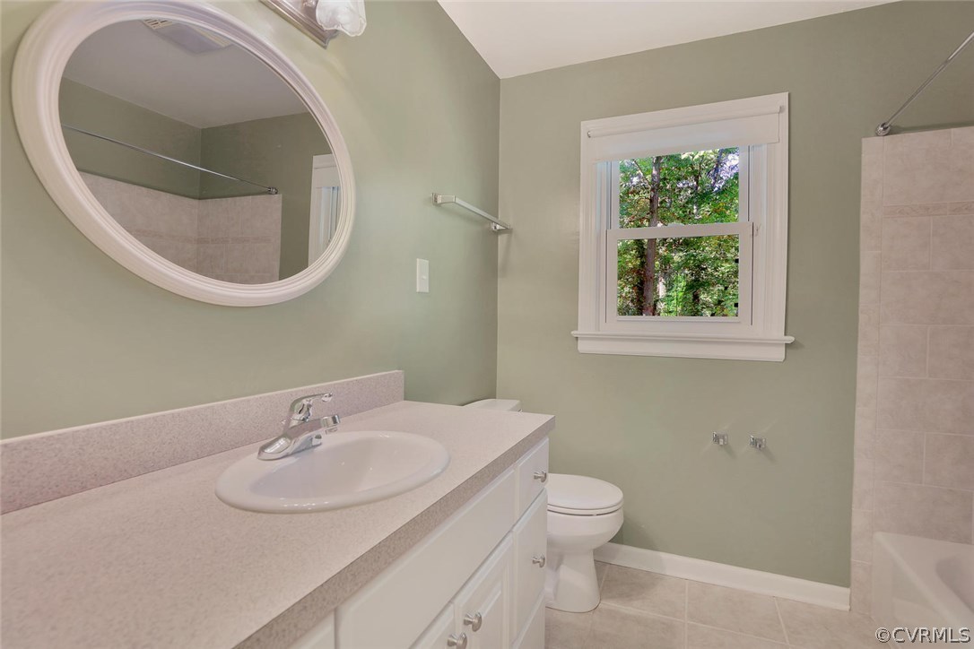 1930 Esquire Road North Chesterfield, VA 23235 - Photo 17 of 26 a bathroom with a sink and a mirror