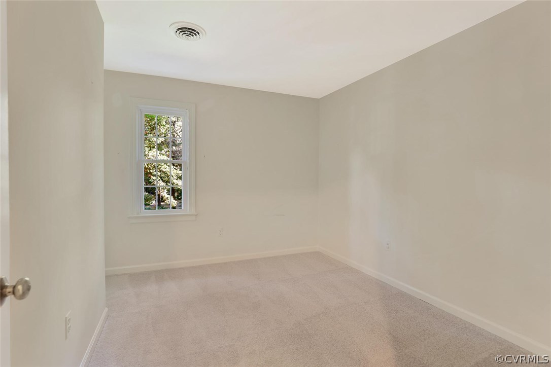 1930 Esquire Road North Chesterfield, VA 23235 - Photo 20 of 26 an empty room with windows