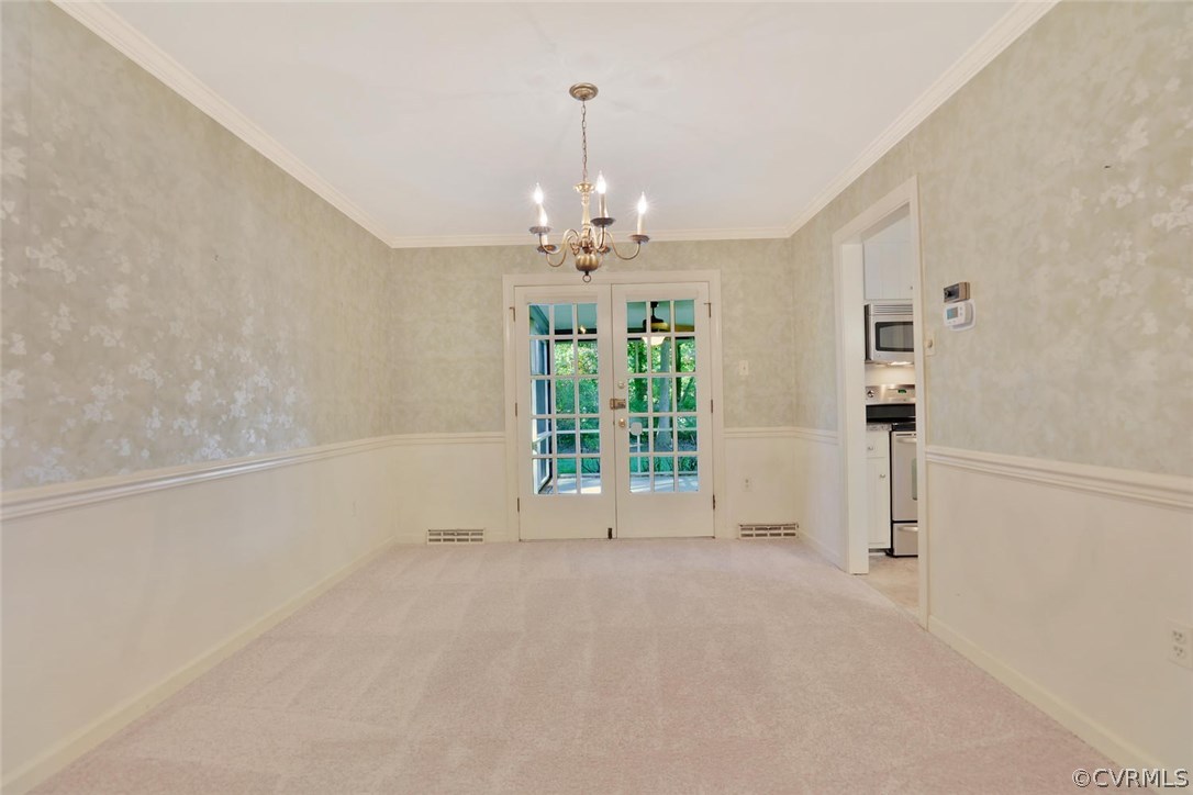 1930 Esquire Road North Chesterfield, VA 23235 - Photo 6 of 26 wooden floor in an empty room with a window