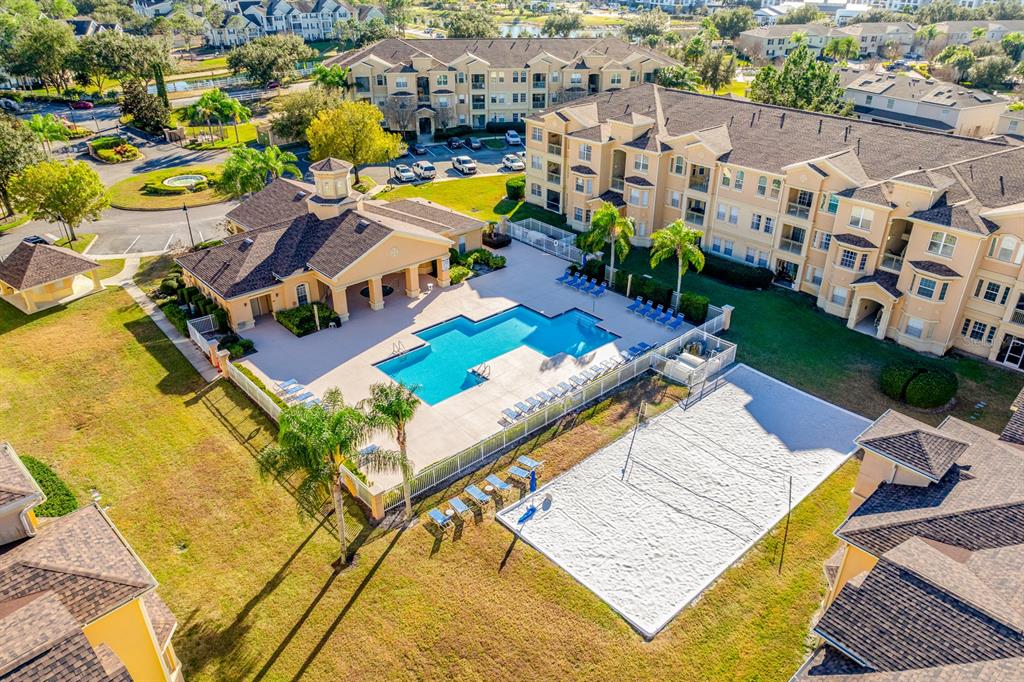 102 Terrace Ridge Circle, Unit 102 Davenport, FL 33896 - Photo 25 of 32 an aerial view of a house with a swimming pool