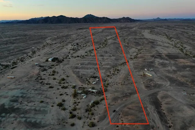 a view of a house with a mountain