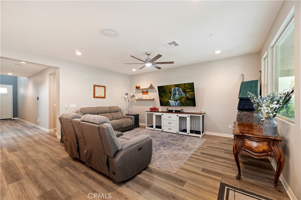 39526 Verbena Way Temecula, CA 92591 - Photo 24 of 55 a living room with furniture and a flat screen tv