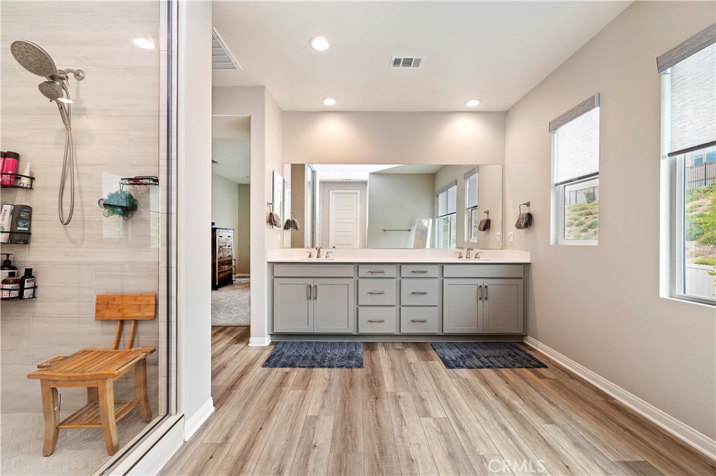 39526 Verbena Way Temecula, CA 92591 - Photo 33 of 55 a bathroom with a sink a toilet and shower