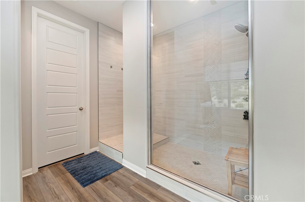 39526 Verbena Way Temecula, CA 92591 - Photo 34 of 55 a bathroom with a shower