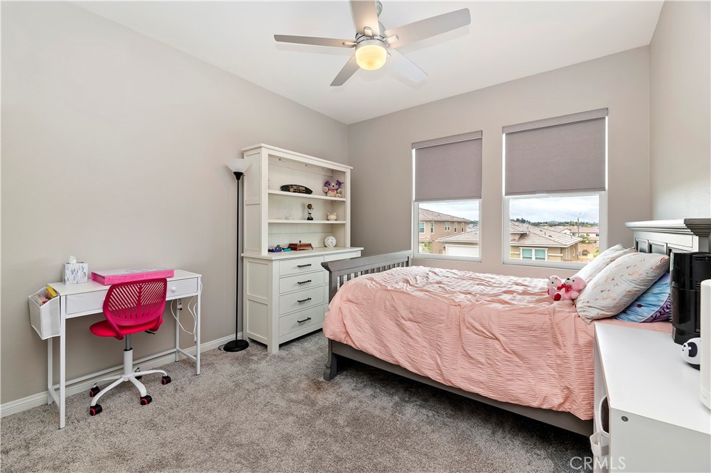 39526 Verbena Way Temecula, CA 92591 - Photo 38 of 55 a bedroom with a bed and a dresser