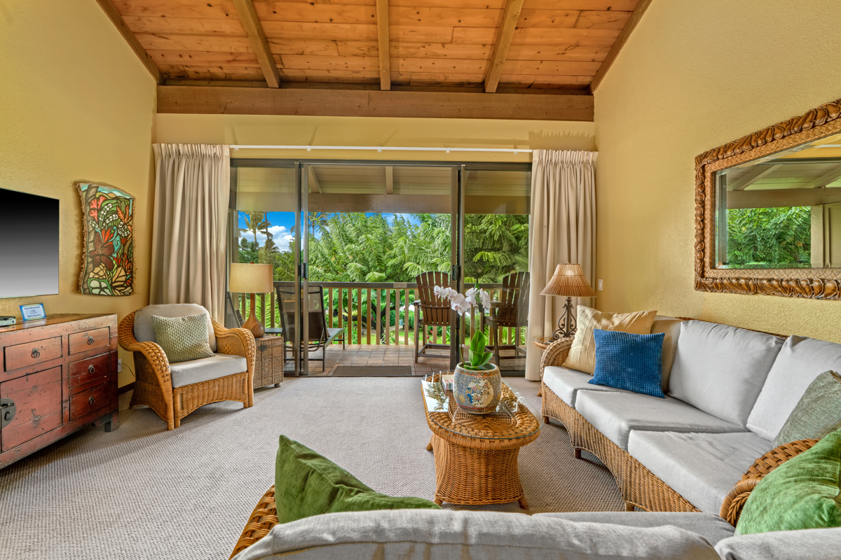 1870 Hoone Road, Unit 602 Koloa, HI 96756 - Photo 9 of 26 a living room with furniture and a floor to ceiling window