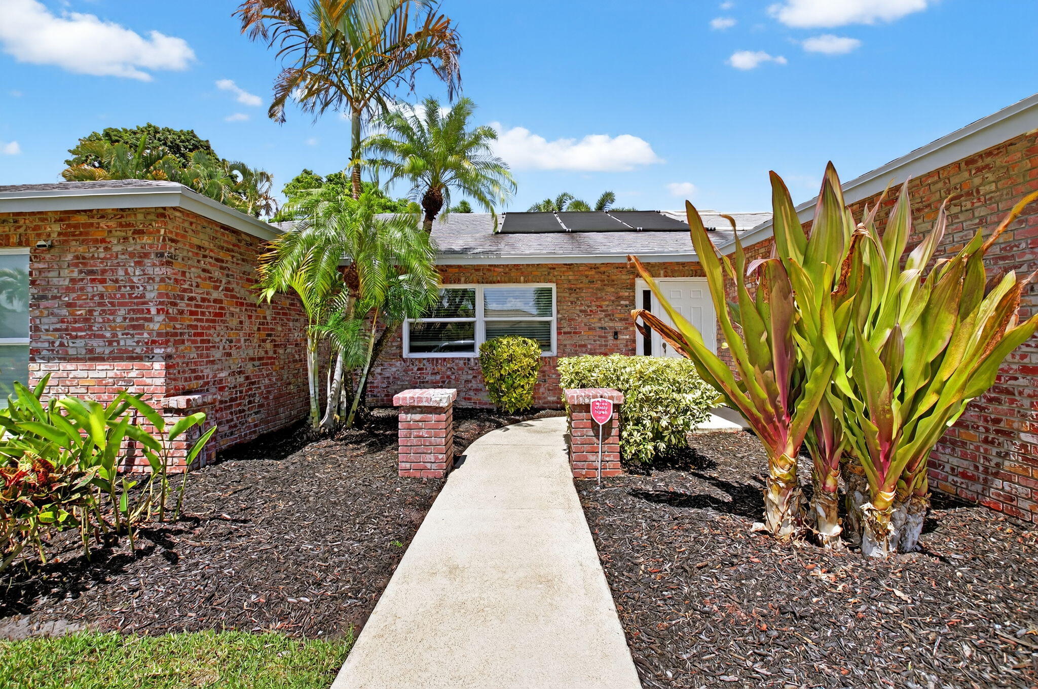 17414 Springtree Lane Boca Raton, FL 33487 - Photo 4 of 49 a view of a chairs and table in backyard