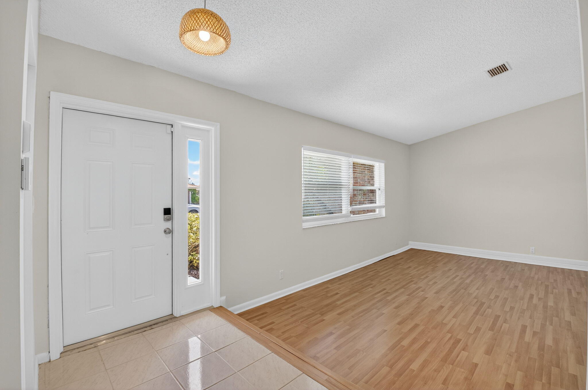 17414 Springtree Lane Boca Raton, FL 33487 - Photo 7 of 49 an empty room with windows