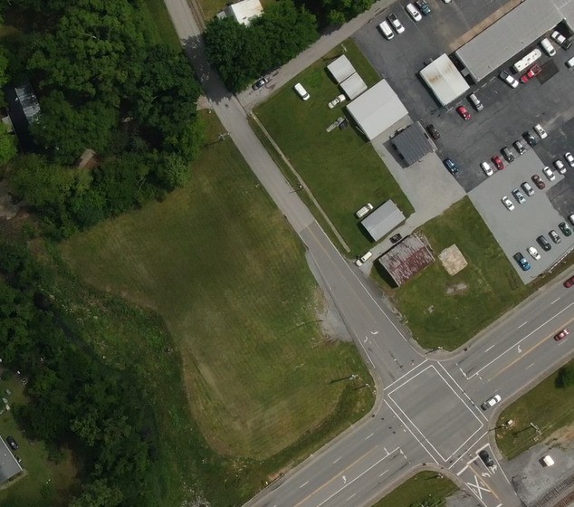 107 East Jackson Avenue Spring City, TN 37381 - Photo 5 of 8 an aerial view of tennis court