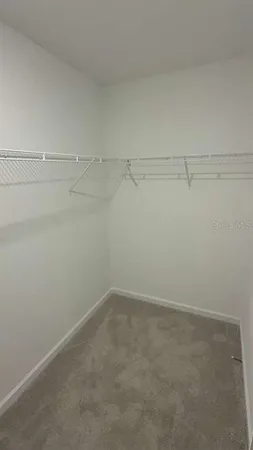 a view of a room with racks on the wall