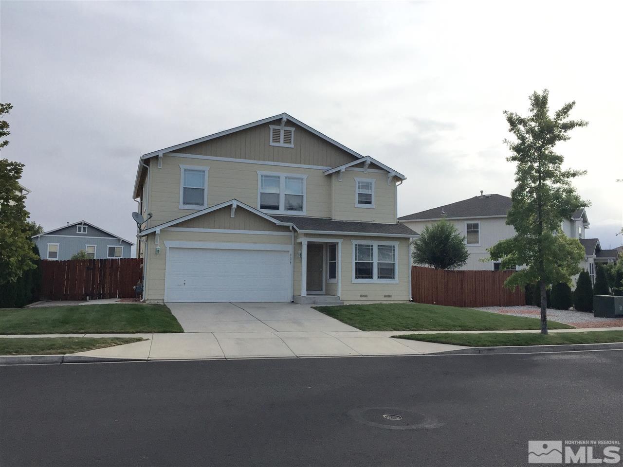 7827 Tulear Street Reno, NV 89506 - Photo 1 of 1 front view of a house with a yard