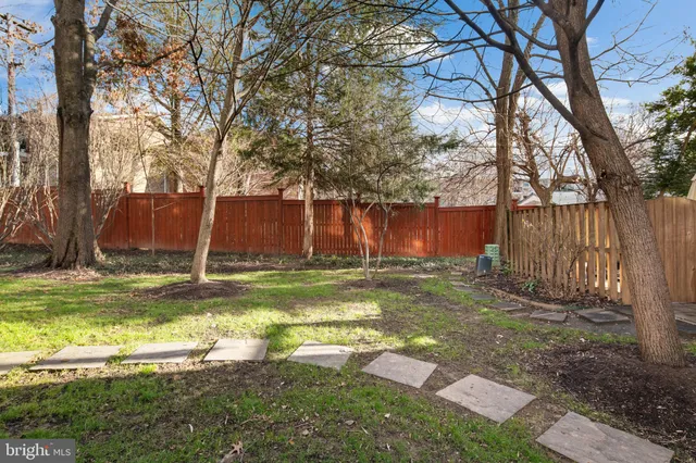 a view of swimming pool with tree s