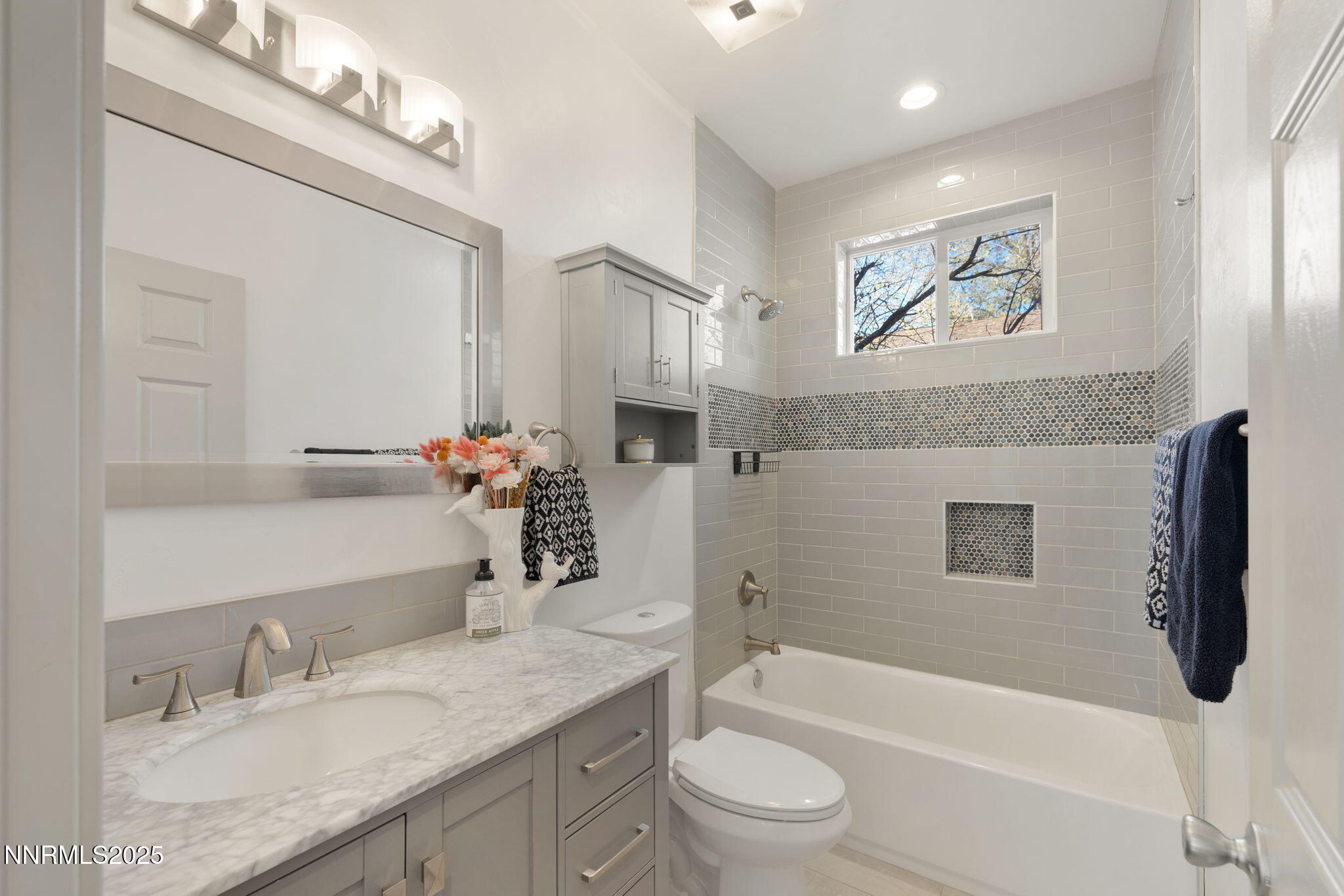 1217 Lander Street Reno, NV 89509 - Photo 14 of 20 a bathroom with a granite countertop sink toilet and shower