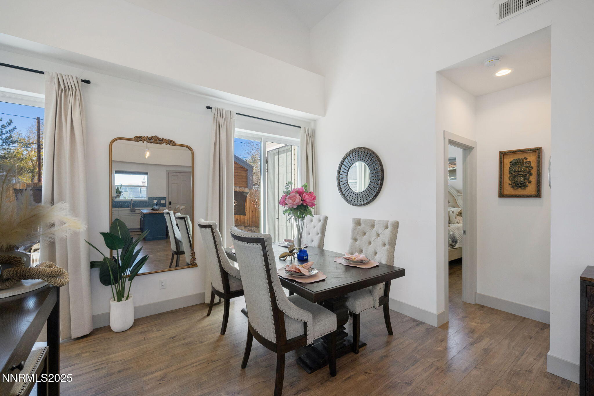 1217 Lander Street Reno, NV 89509 - Photo 7 of 20 a view of a dining room with furniture and wooden floor