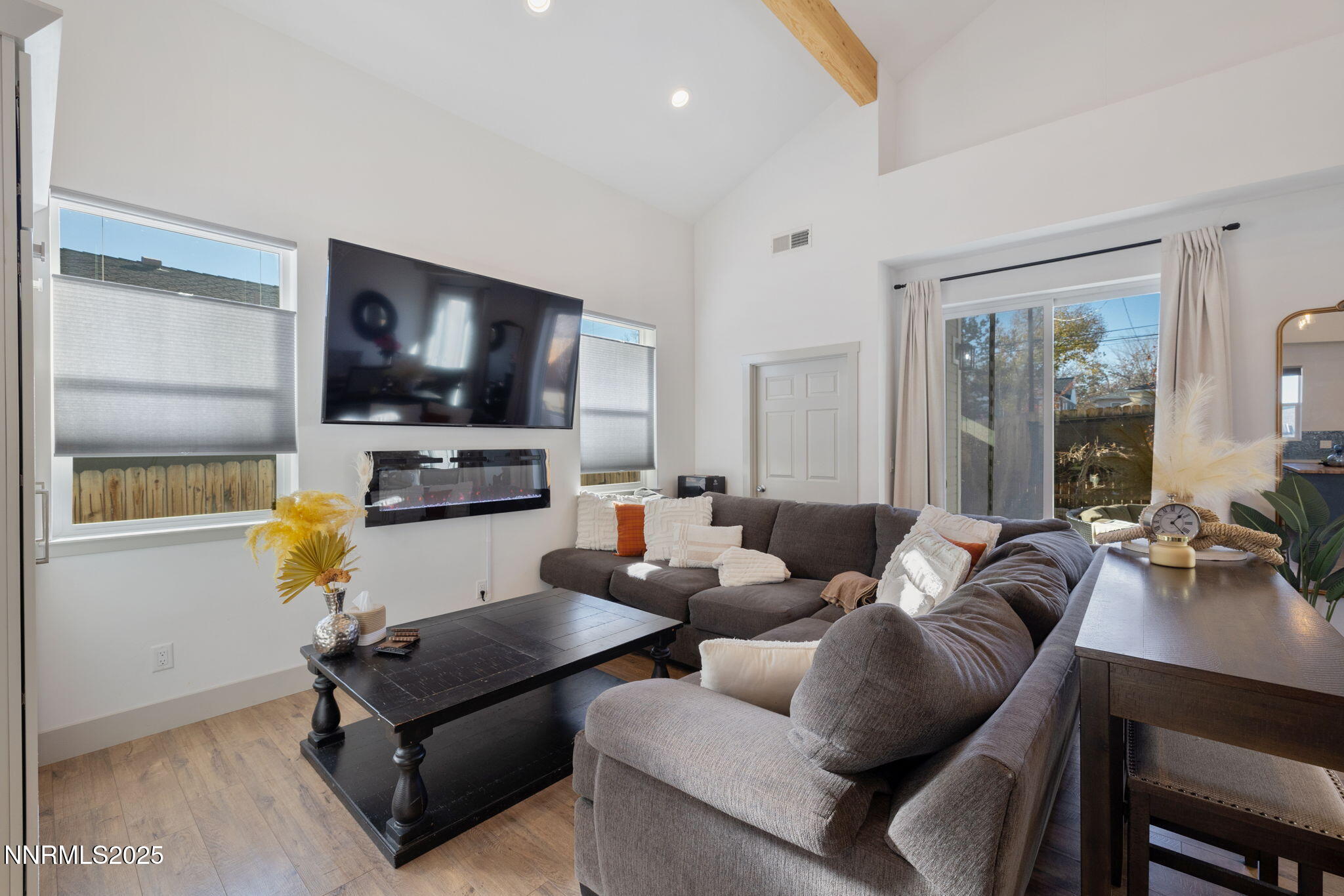1217 Lander Street Reno, NV 89509 - Photo 9 of 20 a living room with furniture and a flat screen tv