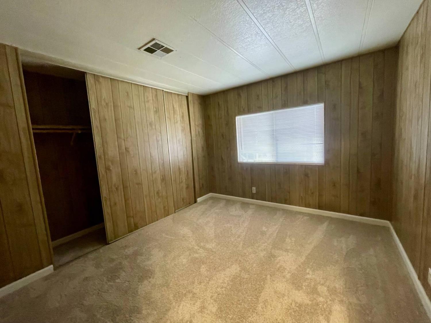 3901 Lake Road, Unit 111 West Sacramento, CA 95691 - Photo 14 of 16 a view of an empty room with a window