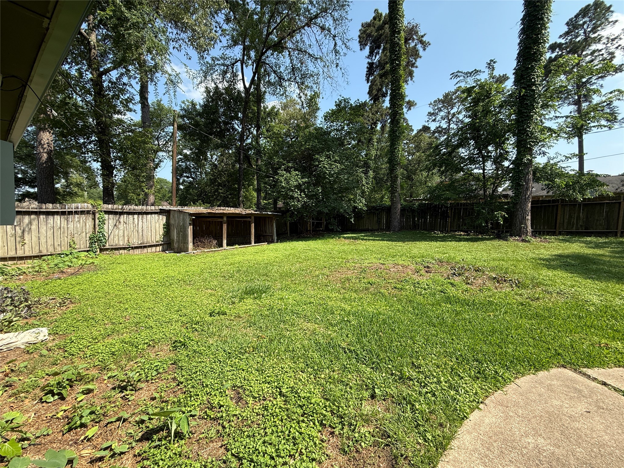 422 Gamewood Drive Spring, TX 77386 - Photo 24 of 25 a view of a backyard with a garden