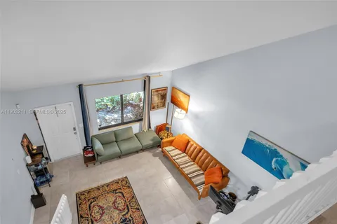 a living room with furniture and a couch