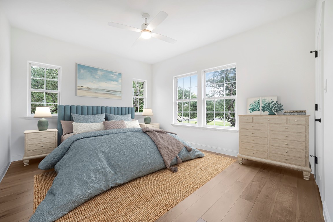 10903 Centennial Trail Austin, TX 78726 - Photo 24 of 31 Bedroom with wood finished floors and ceiling fan