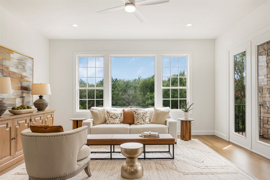 10903 Centennial Trail Austin, TX 78726 - Photo 6 of 31 Living area featuring light wood finished floors, a ceiling fan, and recessed lighting