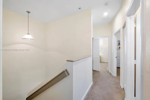 a view of a hallway with closet