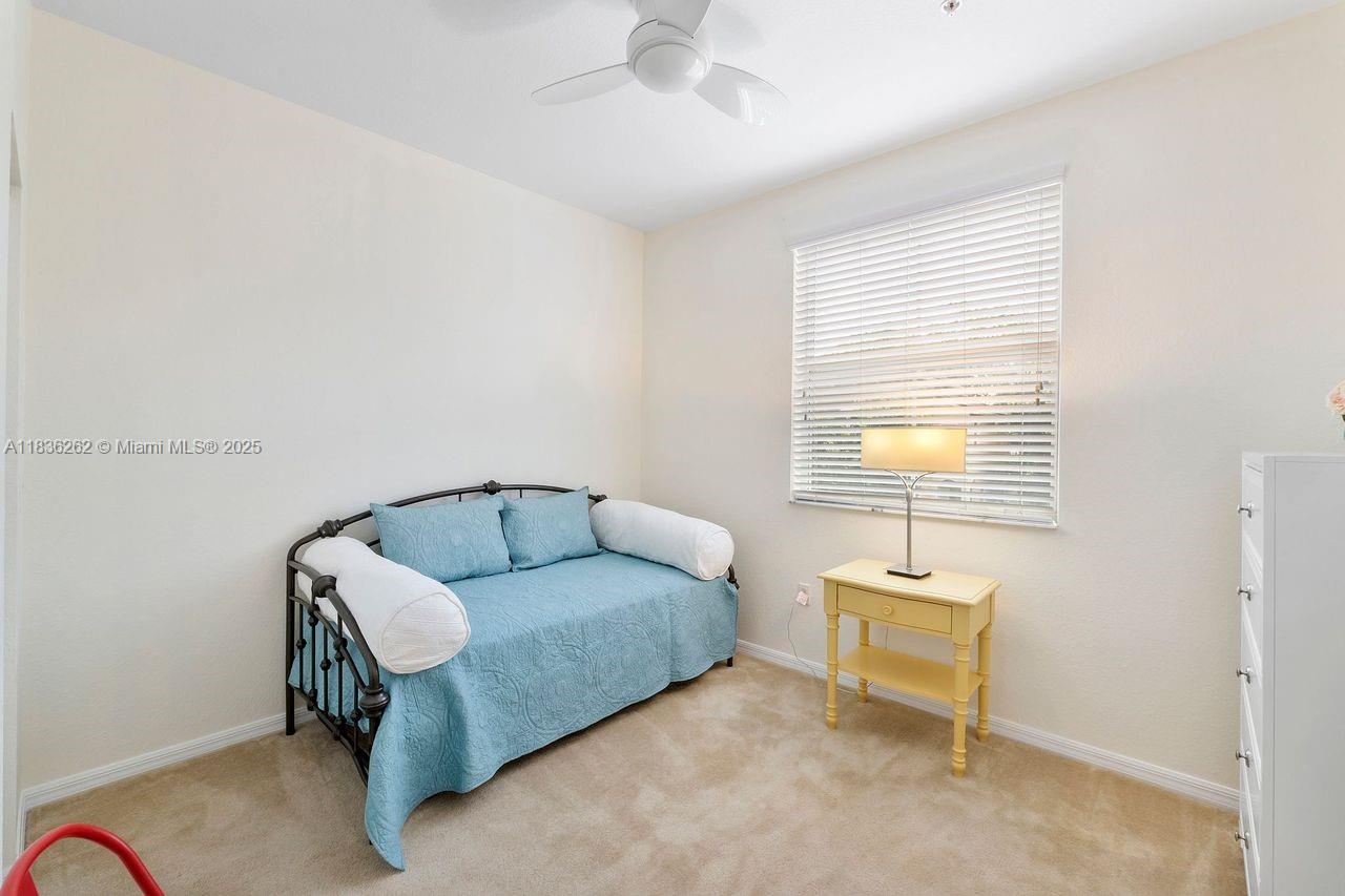 2851 Prospect Road, Unit 1306 Tamarac, FL 33309 - Photo 26 of 39 a living room with furniture
