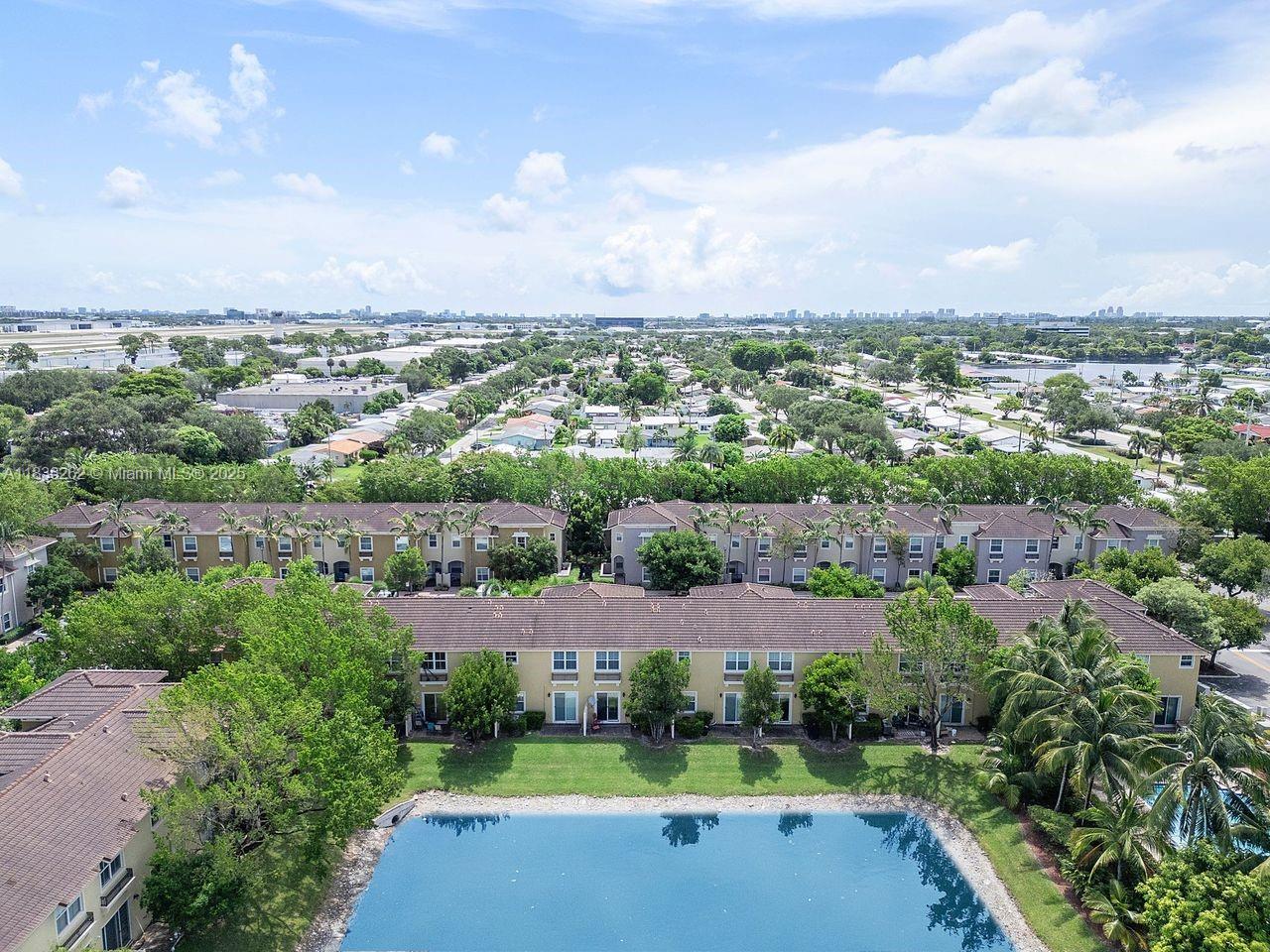 2851 Prospect Road, Unit 1306 Tamarac, FL 33309 - Photo 37 of 39 an aerial view of a house with a garden
