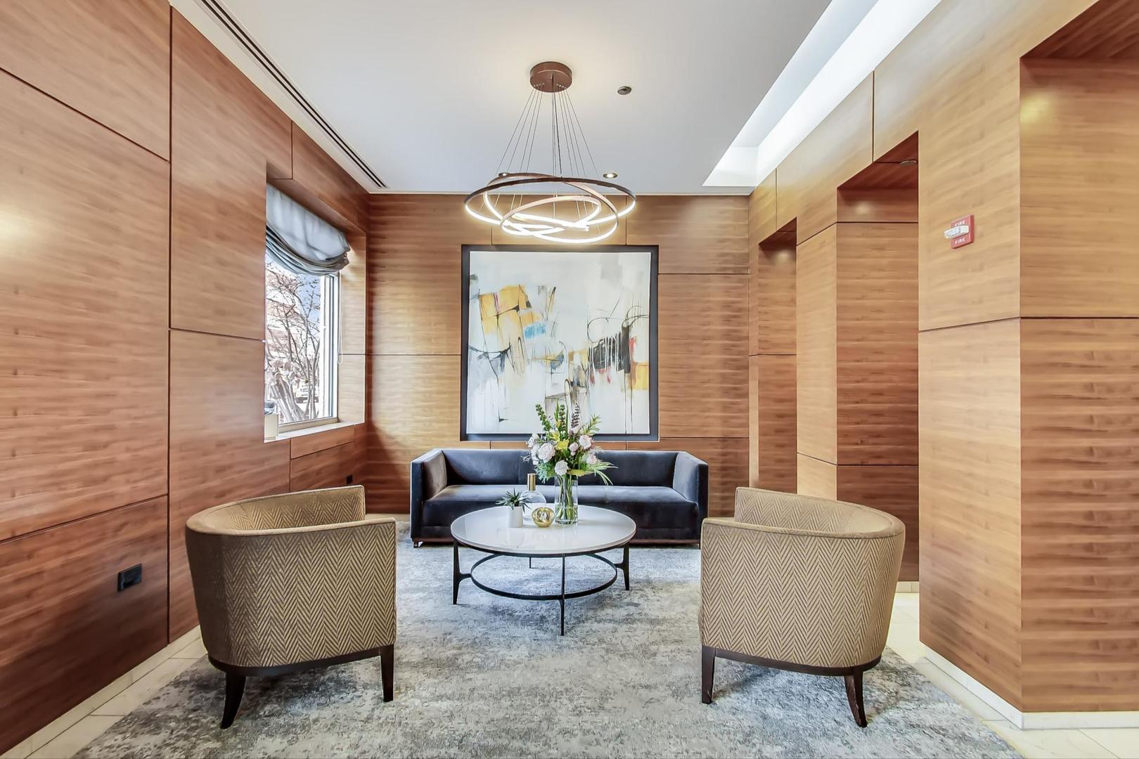 Undisclosed Address Chicago, IL 60616 - Photo 2 of 31 a living room with furniture and a large window